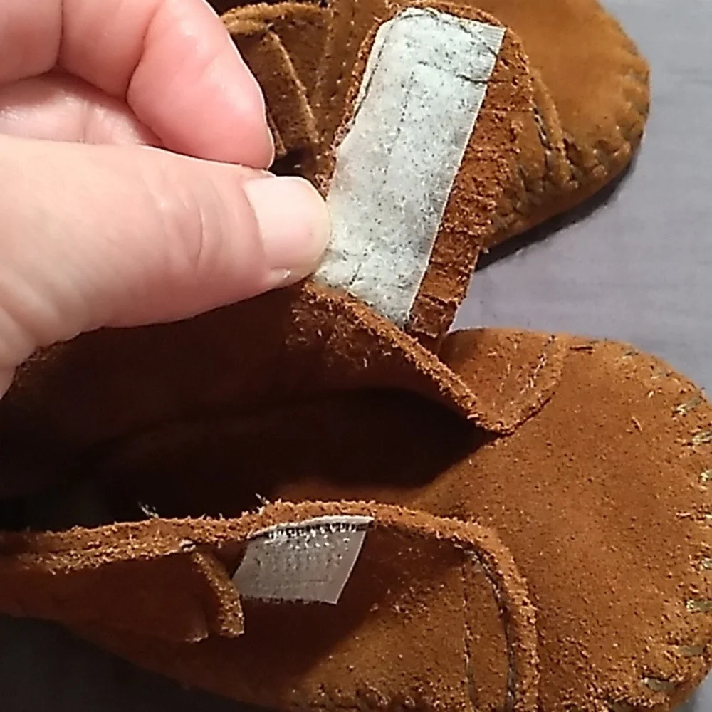 Minnetonka brown baby front strap moccasins